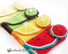 a crocheted bag with fruit on it