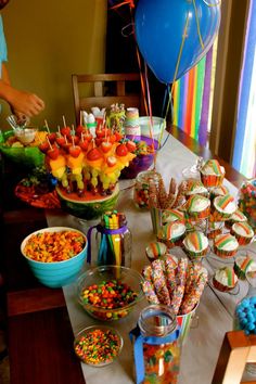 a table topped with lots of candy and candies