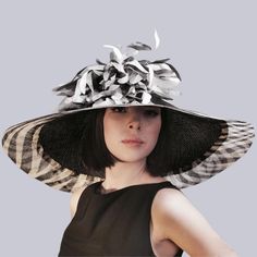 Elegant Derby Hat Black&White Wide Brim Headwear This elegant Wide Brim Derby Hat looks amazingly stunning and ideally accessorizes a multitude of your apparel. Whether you choose a classical dress or a modern and stylish outfit for the upcoming event, this derby hat will surely bring out the magnetism and charisma you are looking for.  * Handmade;  * 57cm(22,4 inches)-59cm(23,23 inches)sizes;  * Created using high-quality handwoven para sisal straw;  * The interior is trimmed with grosgrain rib Modern Fitted Hats For Spring, Luxury White Hats For Spring, Luxury Fitted White Hat, Modern Fitted Summer Hats, Modern Black Hats For Spring, Modern Black Spring Hats, Chic Fitted White Hat, Chic White Fitted Hat, Luxury Black Hat For Spring