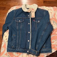 Women’s Medium Jacket. New. Sherpa Inside. Open To Reasonable Offers Winter Dark Wash Outerwear With Button Closure, Levi's Denim Blue Outerwear For Fall, Levi's Dark Wash Fall Outerwear, Levi's Dark Wash Outerwear For Fall, Levi's Denim Fall Outerwear, Levi's Denim Outerwear For Fall, Levi's Long Sleeve Denim Outerwear, Levi's Winter Denim Jacket With Button Closure, Levi's Winter Denim Jacket