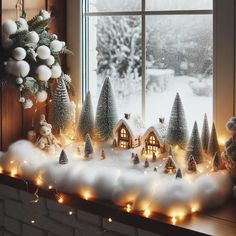 a window sill with christmas decorations and lights on the windowsill, in front of a snowy scene