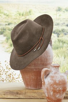 Top off your style with an adventuresome attitude. This felted wool fedora has a braided leather band and adjustable inner elastic pull cord. Easy to roll for storage or packing. Packable Hat, Indigo Floral, Denim Crafts Diy, Wool Fedora, Denim Crafts, Box Pleats, Braided Leather, Leather Band, Jacket Style