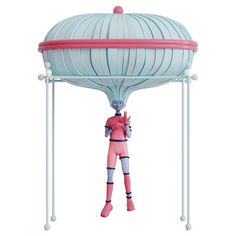 a person in pink is standing under a large object