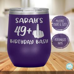 a purple wine tumbler with the words sapah's 59 + birthday bash on it