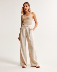 High rise pants in our breezy linen-blend fabric and ultra-wide leg silhouette, that has a slightly fuller leg shape than our Sloane pant. Features a clean fixed waistband, figure-flattering pleat detail, pockets and a functional zipper. Womens Matching Sets, Zipper Crafts, Linen Blend Pants, Weekend Style, High Rise Pants, Linen Trousers, Tailored Pants, Professional Look, Casual Tee