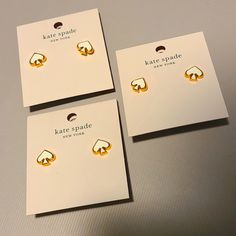 Nwt Kate Spade New York Stud Earrings - Gold Plated W White Enamel Detail - Would Make An Adorable Bride &/Or Bridesmaid Gift - 3 Pairs Available - Make Me An Offer For A Single Or All 3 :) Kate Spade White Earrings For Gift, Kate Spade Jewelry Gift Set With Earrings, Kate Spade Jewelry Gift Set With Matching Earrings, Kate Spade Jewelry With Matching Earrings For Gift, Kate Spade Gold Earrings For Pierced Ears, Kate Spade Spring, Kate Spade Earrings Stud, Kate Spade Heart, Kate Spade Studs