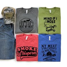 four t - shirts with different sayings on them, including one for the grill