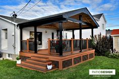 a house with a deck and covered porch