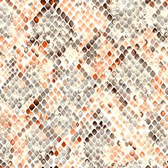 an orange and white mosaic tile pattern