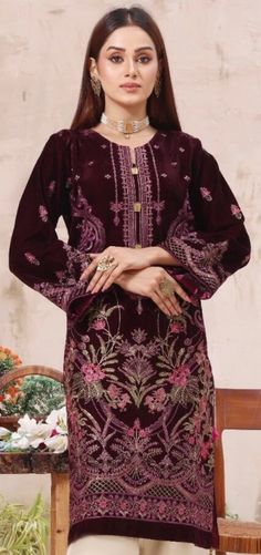 It is a beautiful ready to wear kurta for women. It is available in 2 sizes. Small  Chest 38 inches all around, waist 38, hips 42 and length 39 inches. Large Chest 45 inches all around, waist 44, hips 46 and length 39 inches. This is a beautiful fully embroided kurta with tilla thread embroidery, sequins and tussles on it. It is just a kurta no pants with this . The fabric is velvet which is very soft and lightweight. Color dark purple. No return or exchange please. Velvet Kurtis, Kurta For Women, Pakistani Salwar, Designer Salwar Kameez, Pakistani Salwar Kameez, Designer Kurtis, Designer Kurti, Designer Salwar, Thread Embroidery