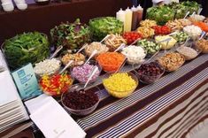 a buffet table filled with lots of different foods