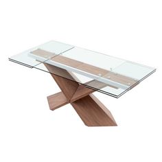 a glass and wood table with an x design on the top, in front of a white background