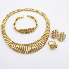 Afraic Jewelry-24k Fashion Jewelry Jewelry Sets Necklace Earrings For Women Model Number:3256804436766156 Product information: Material: alloy Color: Gold Color Product Package Details: 1 Set (Neckace, Bracelet, Earrings,Ring) Fashion Jewelry Jewelry Sets Necklace Earrings For Women PRODUCT DETAILS: Handmade, finely polished, reliable quality, gives you beauty, but also offers you the most comfortable wearing experience. 348-1 PRODUCT DETAILS: Handmade, finely polished, reliable quality, gives y Gold Alloy Jewelry Sets For Party, Gold Alloy Party Jewelry Sets, Gold-plated Jewelry Sets For Party, Formal Gold Alloy Jewelry, Gold Plated Alloy Jewelry Sets, Gold-plated Alloy Jewelry Sets, Gold-plated Metal Jewelry Sets, Gold-plated Jewelry Sets For Anniversary, Gold Plated Jewelry Sets For Anniversary