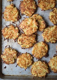 some food is sitting on a baking sheet and ready to be cooked in the oven