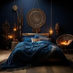 a bed with blue sheets and pillows in a dark room next to two wicker lamps