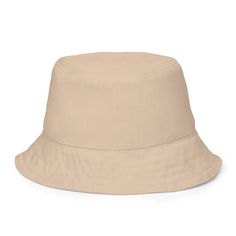 Inspired by the traditional barkcloth designs of the Pacific Islands, our Tapa Cloth print reversible bucket hat features bold tribal patterns on one side and a plain color on the other. This versatile and stylish hat gives you two unique looks in one, adding a touch of island charm to any outfit. Stay cool and stylish wherever you go!This reversible bucket hat can be worn on both sides, making it easy to match with different outfits. Made of breathable premium fabric, this hat will become your