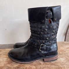 Ugg Cool Black Leather Studded Mid-Calf Boots With Shearling Lined Innersole. Zipper On The Inside Ankle Of Boots For Easy On And Off. Woman's Size 7.5 Measurement: Approximate Length: 10.5” Width: 3 3/4” Heel Height: 3/4” Shaft Height: 8.5” Shaft Circumference At Top: 14” ** Gently Worn Only A Few Time. These Boots Are In Excellent Condition No Noted Flaws. ** From A Smoke Free Environment. ** See All Pictures And Measurements. ** Ask Any Questions You Have. ** Sold As Is With No Returns. Shoes Ugg, Ugg Black, Calf Boots, Mid Calf Boots, Moto Boots, Womens Uggs, Ugg Shoes, Mid Calf, Heel Height