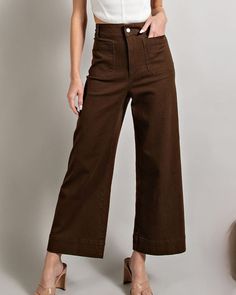 Slip into stylish comfort with our Soft Wide Leg Pants! Made from soft and cozy material, these brown pants offer a flattering wide leg fit. Perfect for a casual day out or lounging at home, they'll be your go-to for both style and comfort. (No wonder they're a fan-favorite) Soft washed wide leg pants with button closure and two front pockets. 100% Cotton Model is 5'9 and wearing a size small Casual Mid-rise Brown Wide Leg Pants, Brown Cotton Wide-leg Pants, Brown Wide Leg Ankle-length Pants For Loungewear, Brown Wide-leg Loungewear Pants, Non-stretch Brown Wide Leg Pants With Pockets, Wide Leg Denim Pants, Bohemian Bridal, Brown Pants, Colored Pants