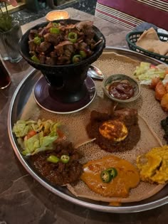 a platter filled with different types of food