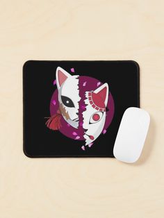 a mouse pad with two cats on it