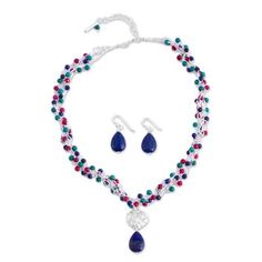 Deep jewel tones contrast elegantly with shining sterling silver in this necklace and earring set. Lapis lazuli forms the pendant of the necklace and dangles from the earrings while beads made of agate reconstituted turquoise and lapis lazuli line the chain. Artisan Alejandra Torres of Mexico handcrafts the exquisite set. Elegant Beaded Teardrop Pendant Jewelry, Elegant Pendant Jewelry With Dangling Beads, Blue Gemstone Beads Drop Earrings, Silver Jewelry With Dangling Teardrop Pendant, Blue Gemstone Bead Drop Earrings, Multicolor Faceted Beads Pendant Jewelry, Elegant Multicolor Teardrop Pendant Jewelry, Elegant Multicolor Jewelry With Dangling Beads, Sterling Silver Beaded Teardrop Necklace