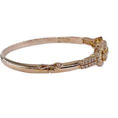 Late Art Deco Early Retro 1.50ctw Diamond Hinged 18K Gold Vintage Bangle Bracelet , Circa 1937History reborn in shimmering Gold, this diamond bracelet bridges the gap between 1937's Art Deco and the future's Retro flair. Bridging eras in sparkling style, this diamond bracelet blends Art Deco's geometric elegance with Retro's playful charm. The perfect fusion of two eras.Made in the first half of the 20th century, this Bangle Bracelet is truly Remarkable. Inspired by Hollywood, it is colorful, bo Luxury Retro Bracelet Jewelry, Luxury Vintage Bracelets With Intricate Design, Luxury Elegant Hinged Bangle, Luxury Adjustable Vintage Bangle, Luxury Vintage Diamond Bracelet Gift, Heirloom Yellow Gold Bracelet With Diamond Accents, Yellow Gold Diamond Bracelet With Intricate Design, Yellow Gold Diamond Bracelets With Intricate Design, Diamond Bracelets With Intricate Design In Yellow Gold