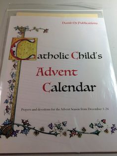 the front cover of catholic child's advent calendar, with an image of a cross on it