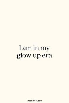 the words i am in my glow up era are black and white, against a cream background