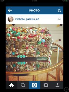 an image of a purse made out of beads and other items on a table with the caption photo