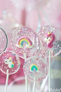 unicorn lollipops with rainbow and stars on them