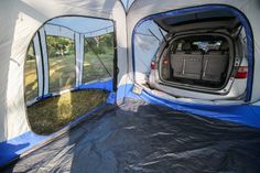 the inside of a tent with its doors open