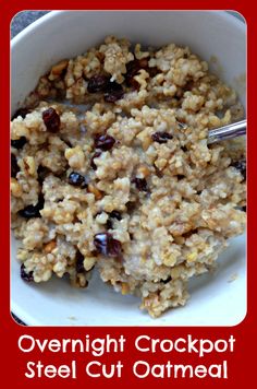 a bowl filled with oatmeal sitting on top of a table