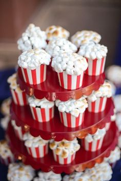 red and white cupcakes stacked on top of each other