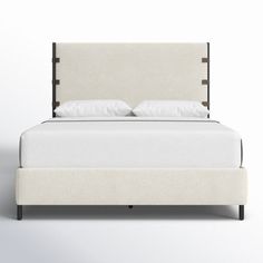 a bed with white sheets and pillows is shown in front of a plain wall behind it