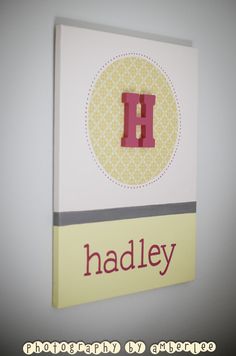 a close up of a card with the letter h on it