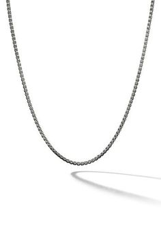 Inspired by classical designs, this sterling silver chain is meticulously crafted by artisans to be worn alone, layered or complemented by unique pendants. 24" length Lobster clasp closure Sterling silver Made in the USA Classic Sterling Silver Chain Necklace, Classic Silver Box Chain Jewelry, Classic Jewelry With Box And Snake Chain, Classic Silver Necklace With Box Chain, Classic Silver Box Chain Necklace, Formal Sterling Silver Box Chain Necklace, Sterling Silver Box Chain Necklace In White Gold, Classic Sterling Silver Single Strand Chain Necklace, Classic Jewelry With Oval Link Box Chain