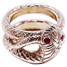 Snake Ring Ruby Victorian Style Cocktail Ring Victorian J Dauphin J DAUPHIN " Reflection of an Angel" Hand Made in Los Angeles The serpent, or snake, is one of the oldest and most widespread mythological symbols. Historically, serpents and snakes represent fertility or a creative life force. As snakes shed their skin through sloughing, they are symbols of rebirth, transformation, immortality, and healing. For Jung the snake of huge importance was significant symbol for the genetic matrix from where all vertebrate life evolved and the Omnipotent and Omnipresent power of "God within" every person. This piece is made to Order and takes 3-4 weeks to be completed. This ring can be made in Us sizes 5-8 Only First image show the Gold and Ruby Version. Snake Ring Gold, Ring Ruby, The Serpent, Bracelet Love, Gold Cocktail Ring, Contemporary Ring, Diamond Cocktail Rings, Snake Ring, Harvey Nichols