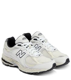 The latest 2002R sneakers from New Balance in cream are a refresh on the running sneakers of the 2000s | New Balance 2002R leather sneakers New Balance 2002r, 24kt Gold, Best Sneakers, Cashmere Cardigan, Together We Can, Sky High, Gold Plated Necklace, Running Sneakers