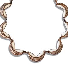 "STYLE NOTE:  Originally MATISSE jewelry was a big hit with Hollywood stars like Lana Turner and Bette Davis. Today it's a favorite of vintage jewelry collectors and can be found in the book by Burkholz and Kaplan, \"Copper Art Jewelry; A Different Luster,\" page 100. 'Seine' features nine linked crescents with a copper seine design over white enamel.  There's a plaque marked 'Matisse' on the back.    Length: 17 5/8\" Width: 5/8\" Copper and white enamel Necklace has a hook fastening  Hallmark:  Matisse   CONDITION:  Excellent vintage condition with wear commensurate with age." Lana Turner, Crescent Necklace, Copper Art, Bette Davis, Enamel Necklaces, Crescent, White Enamel, Hollywood Stars, Jewelry Art