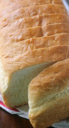 a loaf of bread sitting on top of a napkin