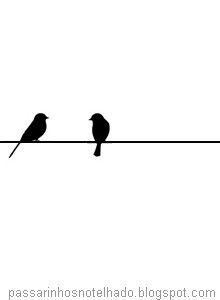 two birds are sitting on a wire and one bird is perched on the other line