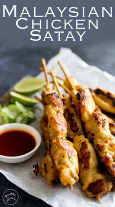 malaysian chicken satay with dipping sauce on the side