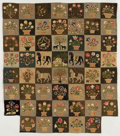 an old quilt with flowers and animals on it's side, in front of a white background