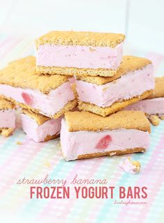 strawberry banana frozen yogurt bars stacked on top of each other with text overlay