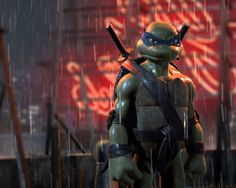 the teenaged ninja turtle is standing in the rain with two swords on his shoulder