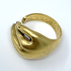 A golden hand to wrap around your finger. Metal: 24kt gold-plate over brass Adjustable Gold Hand Ring, Snake Ring Gold, Knife Necklace, Hand Ring, Gold Hand, Snake Ring, Brass Necklace, Gold Snake, 24kt Gold