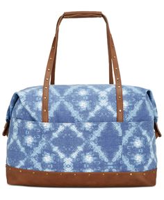 <ul>
 	<li>Tie dye print canvas</li>
 	<li>Brown faux leather</li>
 	<li>Top zip closure</li>
 	<li>Interior zip pocket, 2 interior slip pockets</li>
 	<li>Exterior 2 slip pockets with magnet</li>
</ul> Faux Leather Top, Blue Tie, Blue Ties, Blue Tie Dye, Tie Dye Print, Leather Top, Bags Handbags, Zip Pockets, Duffle Bag