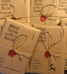 several books wrapped in twine and tied with string, sitting next to each other