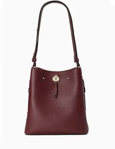 10.62"h x9.84"w x 5.9"dhandle drop: 19.5"pebbled leathermicro suede liningfoil embossed logobucket bag with snap closurestyle # wkru6827Color: Cherrywood Travel Bucket Bag With Silver-tone Hardware, Elegant Pebbled Leather Shoulder Bag For Fall, Pebbled Leather Bucket Bag, Pebbled Leather Bags With Gold-tone Hardware For Fall, Fall Pebbled Leather Bags With Gold-tone Hardware, Leather Bucket Bag With Double Handle And Branded Hardware, Formal Pebbled Leather Bucket Bag, Pebbled Leather Textured Bucket Bag, Pebbled Leather Bucket Bag With Textured Detail