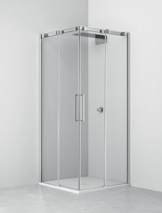 a corner shower stall in a white room